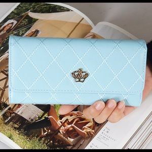 Baby blue wallet with crown. Brand new.